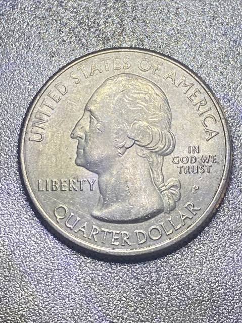 2018 quarter rotated die error showing reverse design significantly misaligned from its standard coin-turn orientation relative to the obverse